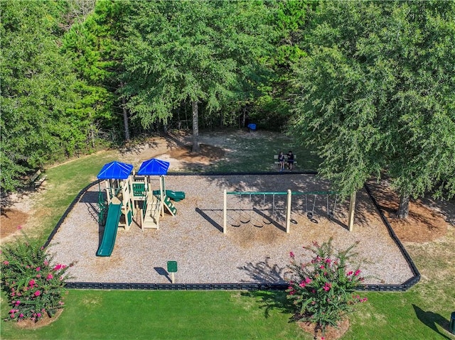 view of jungle gym with a lawn