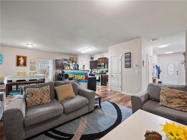 living room with wood-type flooring