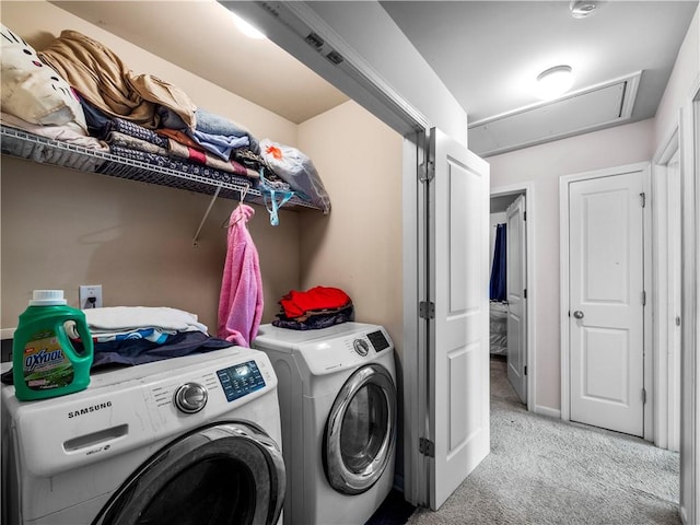 washroom featuring independent washer and dryer and light colored carpet