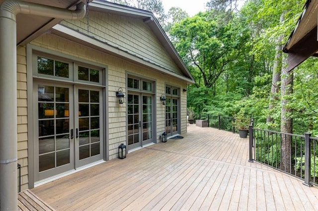 wooden deck featuring french doors