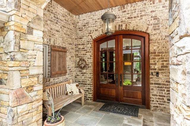 property entrance featuring french doors