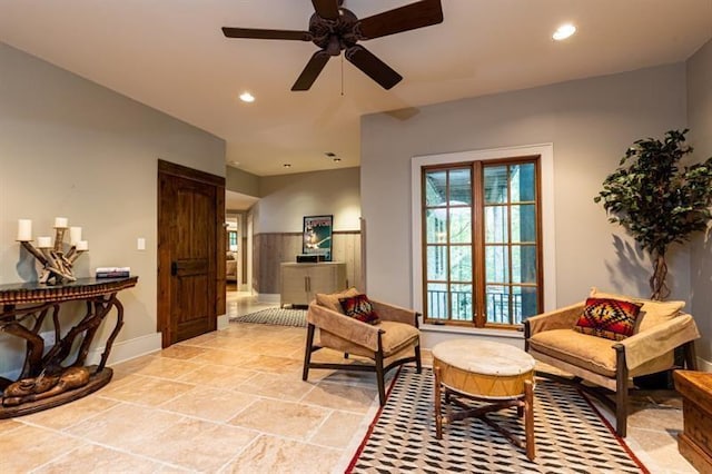 sitting room featuring ceiling fan and recessed lighting