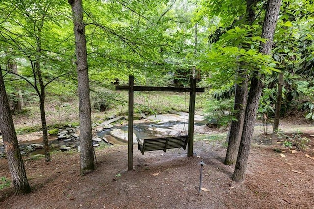 exterior space with a view of trees