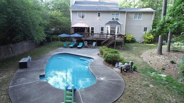 view of swimming pool with a gazebo, a deck, and a patio area