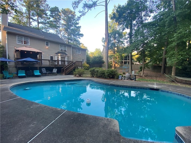 view of pool featuring a deck