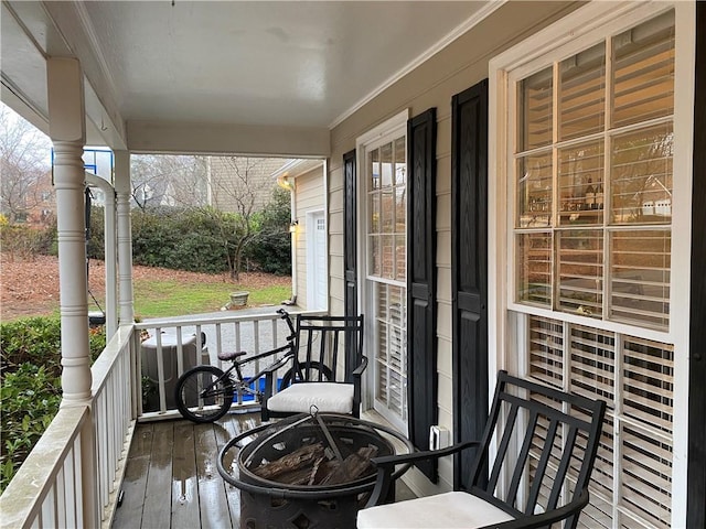 balcony featuring a porch