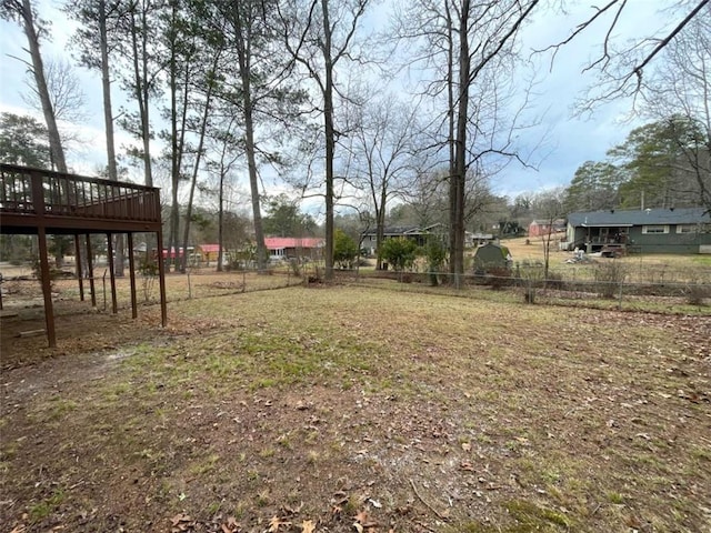 view of yard featuring a wooden deck