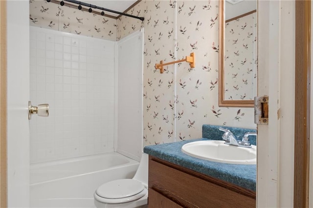 full bathroom featuring toilet,  shower combination, vanity, and wallpapered walls