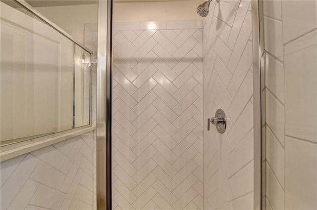 full bathroom featuring a shower stall