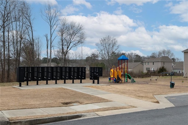 exterior space with mail area and playground community