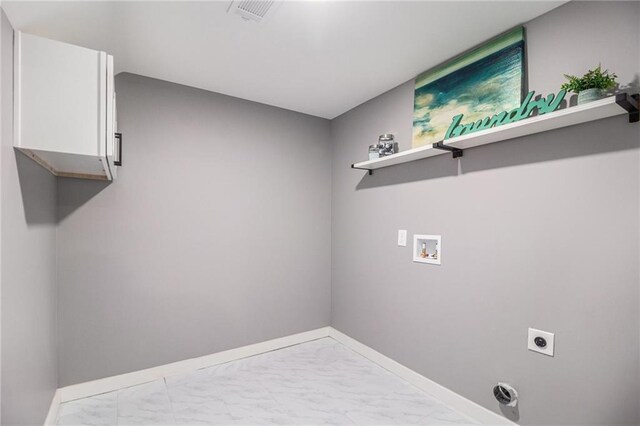 washroom featuring visible vents, marble finish floor, baseboards, hookup for a washing machine, and electric dryer hookup