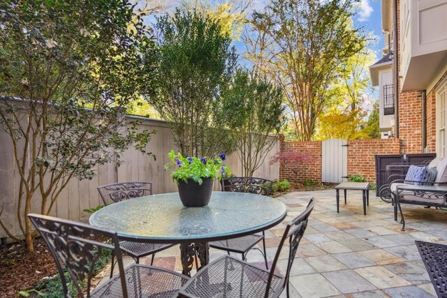 3707 Peachtree Rd NE Unit 8, Atlanta, GA 30319 - view of patio with fence and an outdoor hangout area