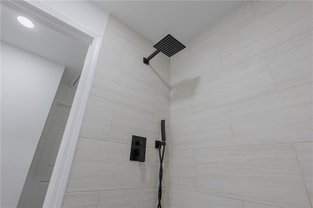 details with a tile shower