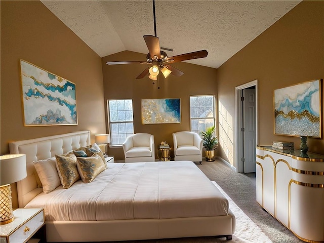 carpeted bedroom featuring ceiling fan, lofted ceiling, multiple windows, and a textured ceiling