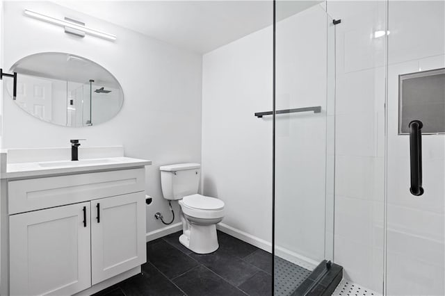 bathroom featuring vanity, walk in shower, tile patterned floors, and toilet