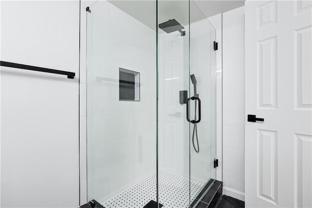 bathroom featuring an enclosed shower