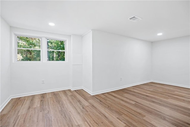 empty room featuring light hardwood / wood-style floors