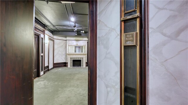 hallway with concrete floors