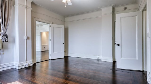 unfurnished bedroom with dark wood-type flooring and ceiling fan