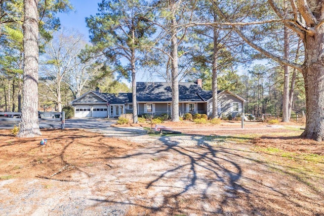 ranch-style home with a garage