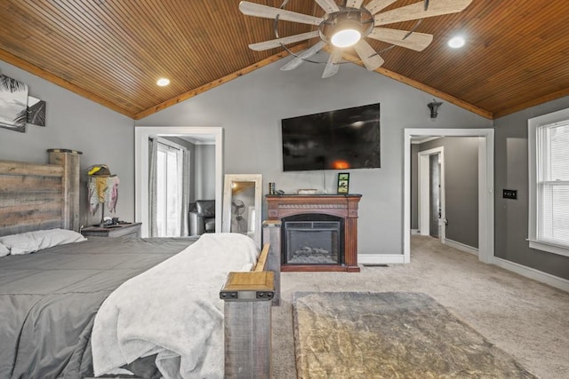 bedroom with vaulted ceiling, carpet, wooden ceiling, and ceiling fan