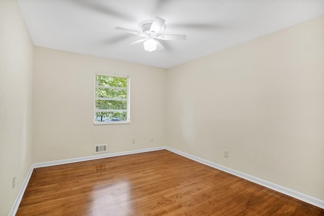 4400 Hickory Wood Ln, Atlanta, GA 30360 - unfurnished room featuring ceiling fan, wood finished floors, and baseboards