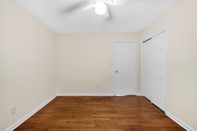 4400 Hickory Wood Ln, Atlanta, GA 30360 - unfurnished bedroom featuring wood finished floors, baseboards, a closet, and ceiling fan