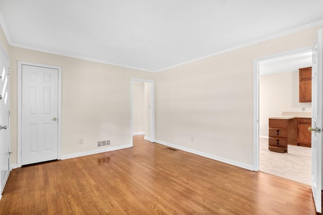 4400 Hickory Wood Ln, Atlanta, GA 30360 - empty room featuring light wood-type flooring, baseboards, and crown molding