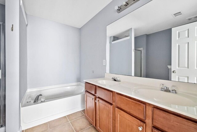 2872 Cross Creek Ct, Cumming, GA 30040 - full bathroom featuring a bath, a sink, visible vents, and a stall shower