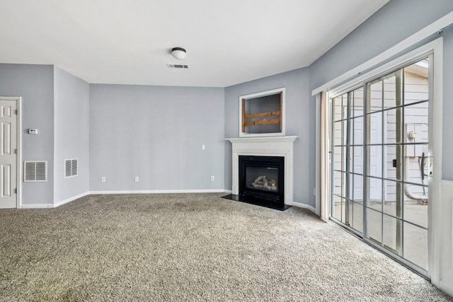 2872 Cross Creek Ct, Cumming, GA 30040 - unfurnished living room featuring a fireplace with flush hearth, carpet, visible vents, and baseboards