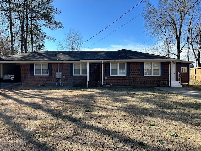 ranch-style home with crawl space, brick siding, a carport, and entry steps