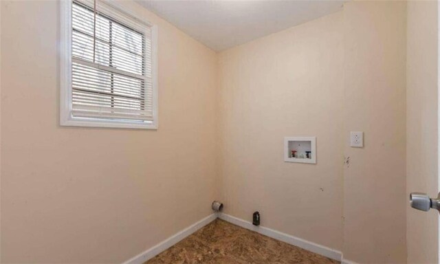 laundry room with baseboards, carpet flooring, laundry area, and washer hookup