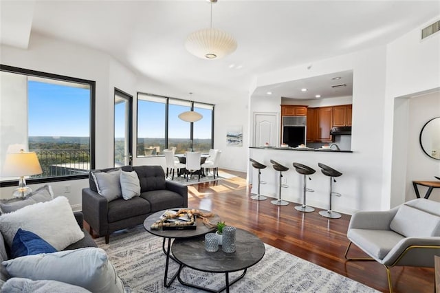 2828 Peachtree Rd NW Unit 1502, Atlanta, GA 30305 - living area featuring light wood-style flooring and recessed lighting