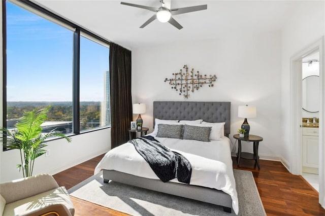 2828 Peachtree Rd NW Unit 1502, Atlanta, GA 30305 - bedroom with wood finished floors, ensuite bath, and ceiling fan
