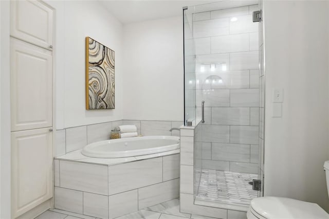 2828 Peachtree Rd NW Unit 1502, Atlanta, GA 30305 - bathroom with a garden tub and a shower stall
