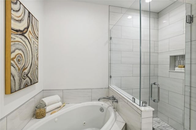 2828 Peachtree Rd NW Unit 1502, Atlanta, GA 30305 - bathroom featuring a tub with jets and a shower stall