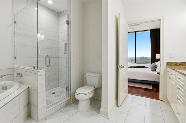 2828 Peachtree Rd NW Unit 1502, Atlanta, GA 30305 - full bathroom featuring a shower stall, a garden tub, vanity, and ensuite bath