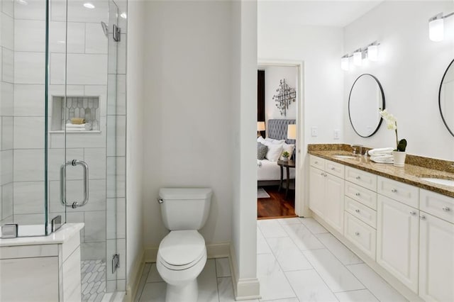 2828 Peachtree Rd NW Unit 1502, Atlanta, GA 30305 - full bathroom with marble look tiles, double vanity, a shower stall, and ensuite bathroom