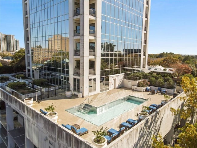 2828 Peachtree Rd NW Unit 1502, Atlanta, GA 30305 - community pool featuring a patio