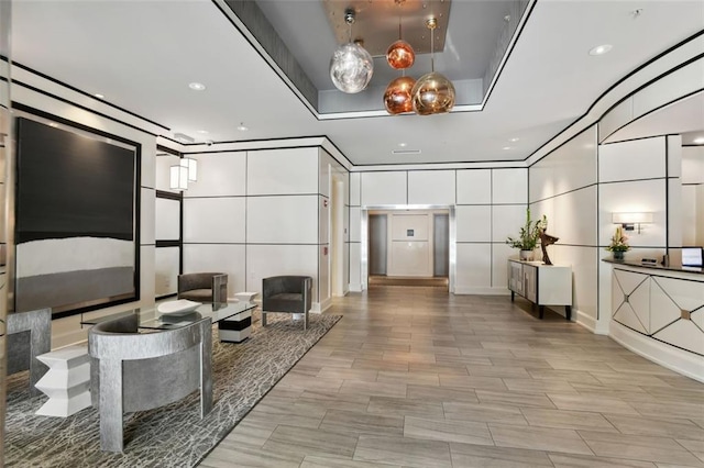 2828 Peachtree Rd NW Unit 1502, Atlanta, GA 30305 - community lobby featuring a decorative wall and recessed lighting