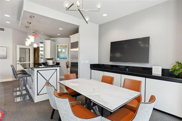 2828 Peachtree Rd NW Unit 1502, Atlanta, GA 30305 - dining room with a chandelier, recessed lighting, and dark carpet