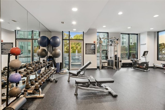 2828 Peachtree Rd NW Unit 1502, Atlanta, GA 30305 - exercise room featuring healthy amount of natural light, floor to ceiling windows, and recessed lighting