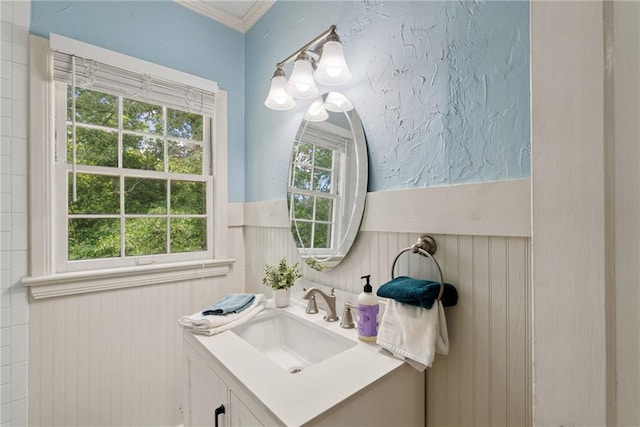 131 Lively St, Norcross, GA 30071 - bathroom with a wainscoted wall, vanity, a textured wall, and crown molding