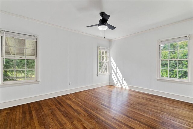 131 Lively St, Norcross, GA 30071 - unfurnished room with crown molding, wood finished floors, baseboards, and ceiling fan