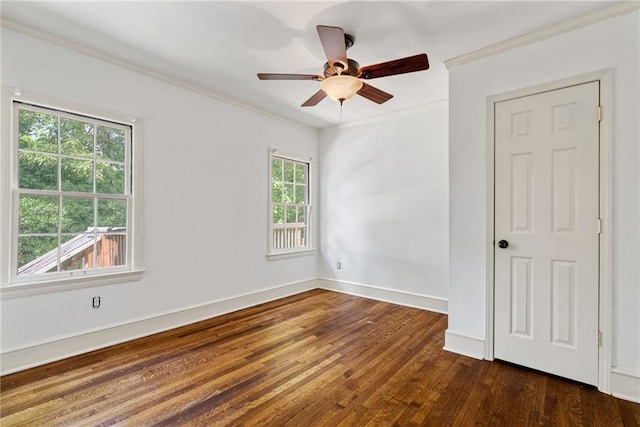 131 Lively St, Norcross, GA 30071 - unfurnished room featuring dark wood-type flooring, crown molding, ceiling fan, and baseboards