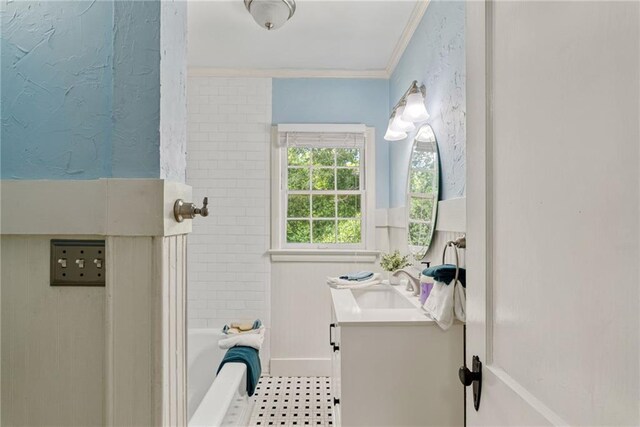 131 Lively St, Norcross, GA 30071 - full bathroom featuring ornamental molding, vanity, baseboards, and a tub to relax in