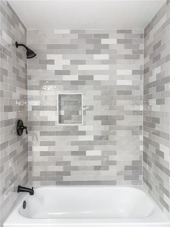 full bath featuring shower / tub combination