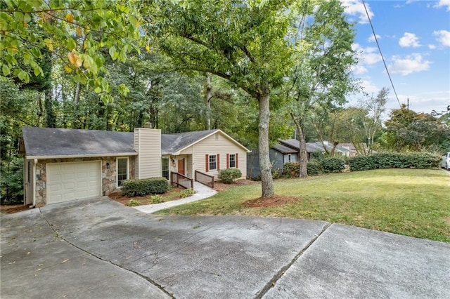 single story home with a front lawn and a garage