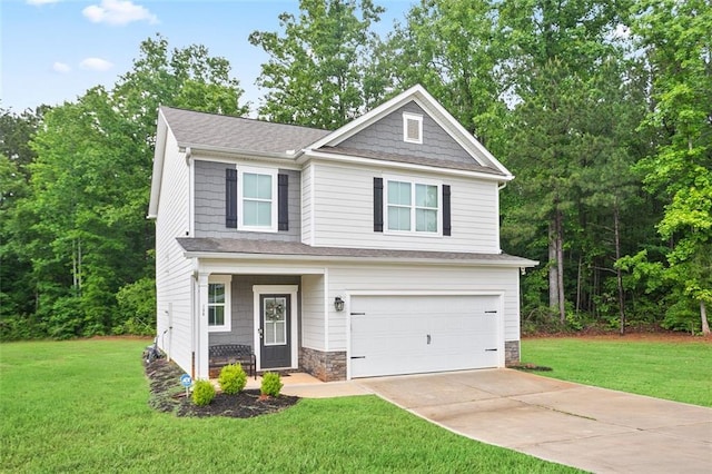 craftsman-style house featuring an attached garage, driveway, a front lawn, and stone siding