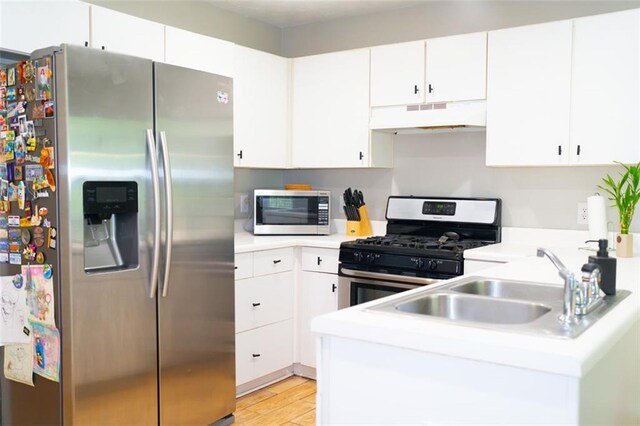 320 Kentshire, Lawrenceville, GA 30044 - kitchen with stainless steel appliances, white cabinetry, and sink